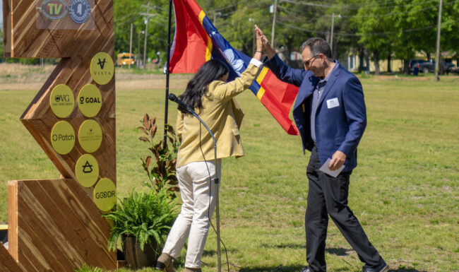 Laura Zapata, Clearloop CEO and co-founder and Eric Kopstain, Vanderbilt University vice chancellor for administration high five in celebration